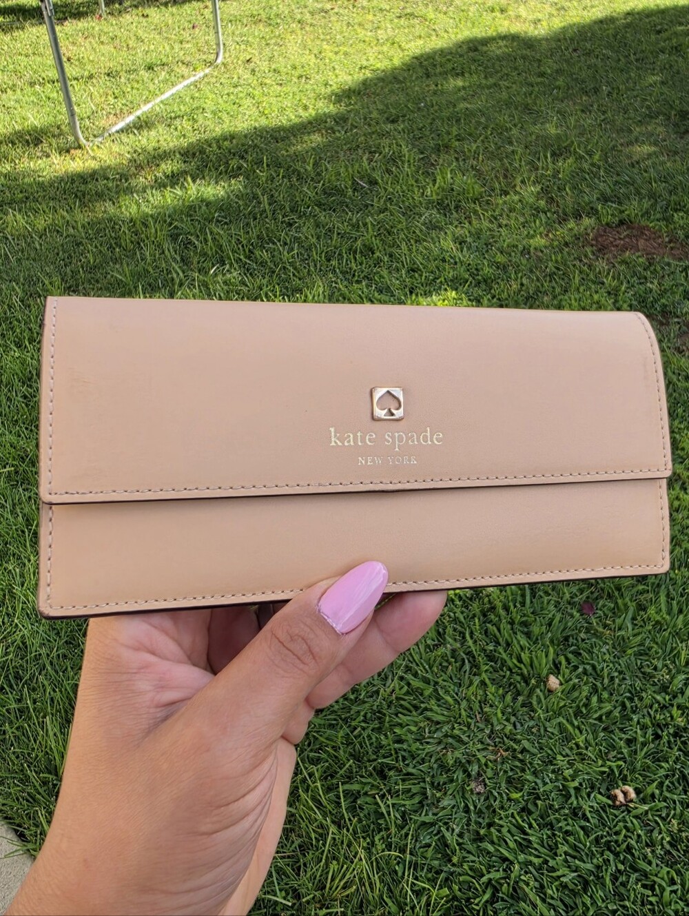 kate spade Beige/Tan Leather Foldover Wallet with Gold Logo